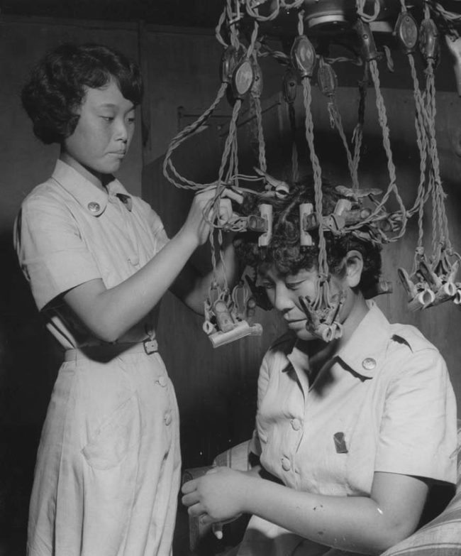 Even though they were advanced for their time, these machines still carried the risk of burning a woman's scalp if the heaters got too close. If the stylist was especially careless, the hair could even catch on fire.