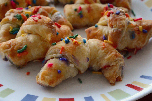 Celebrate your next birthday with these <a href="http://spoonuniversity.com/recipe/how-to-make-your-own-4-ingredient-birthday-cake-croissants/" target="_blank">birthday cake croissants</a>.