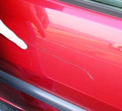 For small wear-and-tear marks, use nail polish as affordable car paint.