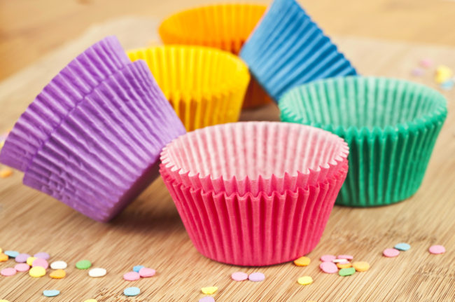 Line your cupholders with cupcake wrappers to cut down on sticky messes.