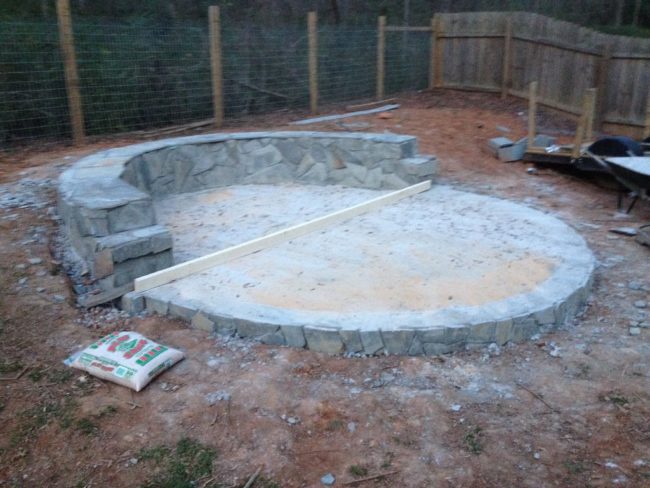 He spread a level of gravel and yellow sand on the patio.