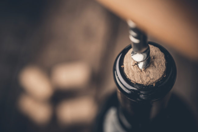 <strong>Life Hack: </strong>Remove a wine cork using a nail and a hammer.
