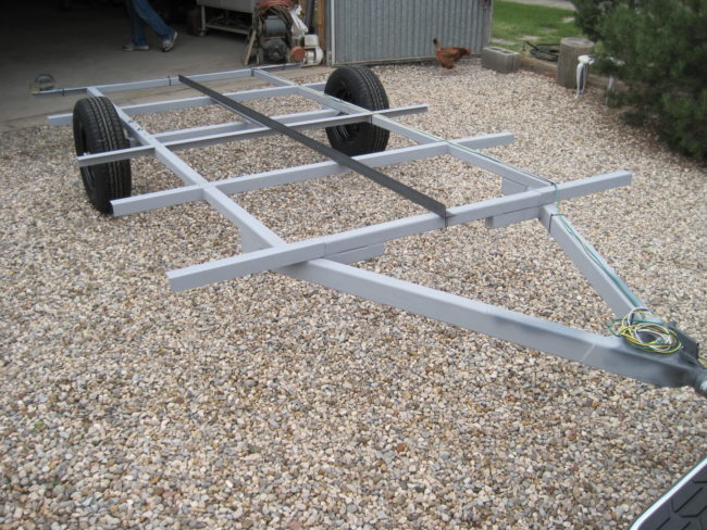 He welded a frame equipped with crossbars for stability.