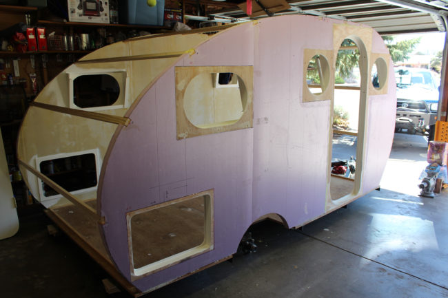 The crafter installed the walls of the camper and covered the interior with durable canvas.