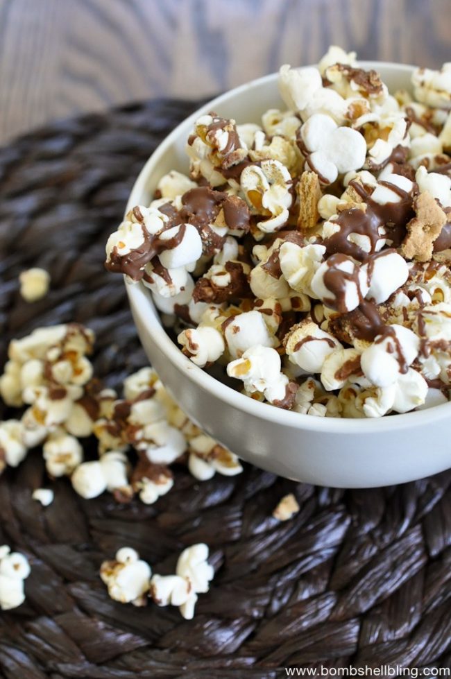 You don't even need a campfire to make this yummy <a target="_blank" href="http://www.bombshellbling.com/smores-popcorn-recipe/">S'mores</a> recipe.