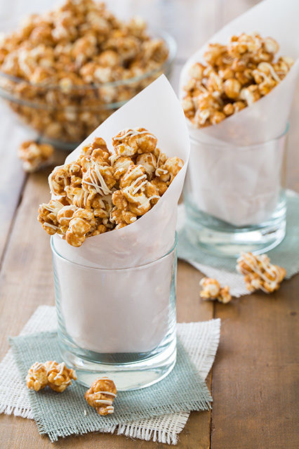 Get ready for fall by making tasty <a target="_blank" href="http://www.cookingclassy.com/2013/08/white-chocolate-pumpkin-pie-spice-popcorn/">pumpkin pie spice</a> popcorn topped with white chocolate.
