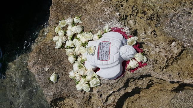 During the ceremony, a brief service is performed on shore before a series of scuba divers send the loved one's remains to their forever home. 