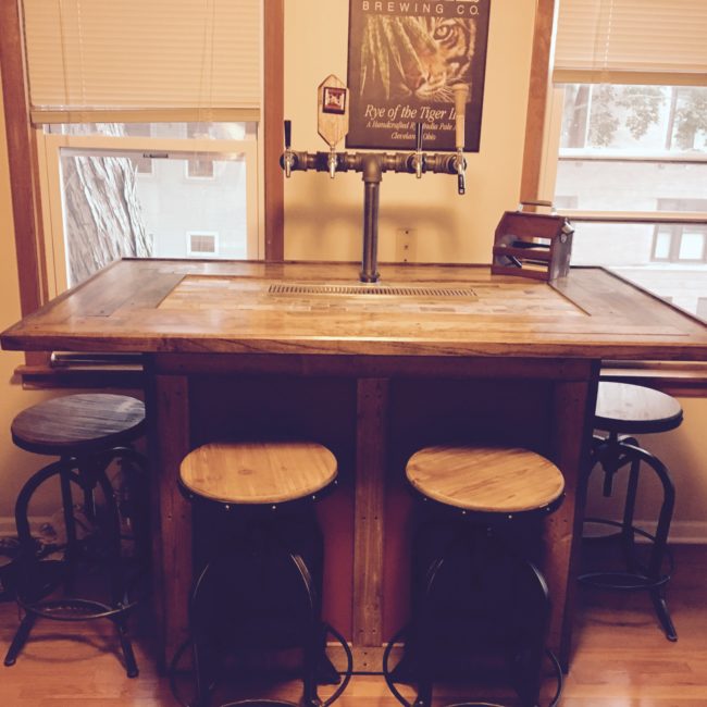 With an awesome bar setup like this, you could open up your very own pub.