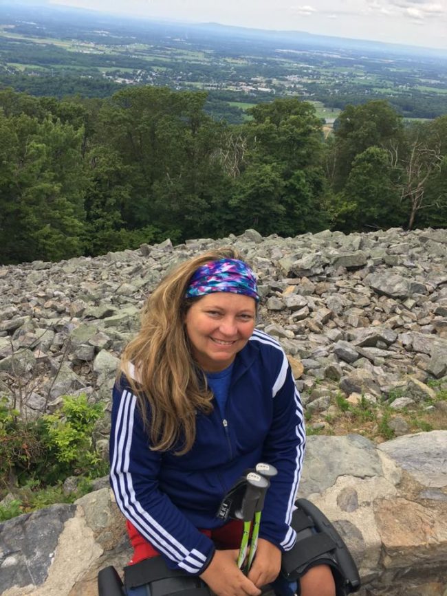 From this picture, 41-year-old Stacey Kozel may look like your average hiking enthusiast.