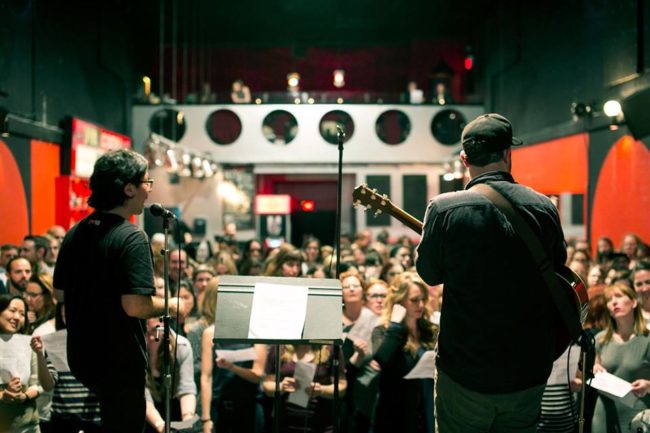 In 2011, Daveed Goldman and Nobu Adilman started the choir as a weekly get-together in Ontario, Canada, for people to sing pop music and enjoy each other's company.