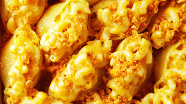 Crushed Ritz crackers make the perfect topping for these gooey <a href="http://www.bitememore.com/feedme/195/macaroni-and-cheese-stuffed-shells-recipe" target="_blank">mac and cheese-stuffed shells</a>.