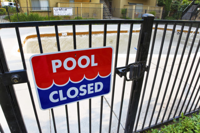 Give your swimming pool one last cleaning before closing it for the season.
