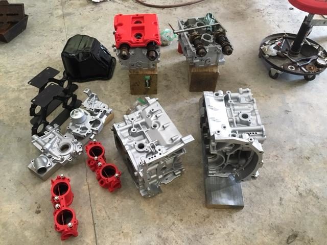 When everything was smooth, he primed the rest of the pieces and coated them with aluminum engine block paint. Pretty snazzy!