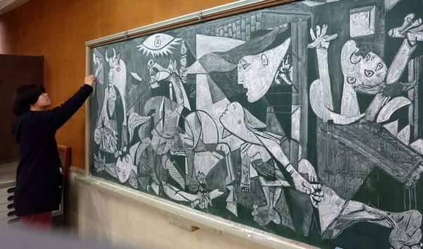 He even gave Picasso's "Guerinca"  a chalkboard replica.