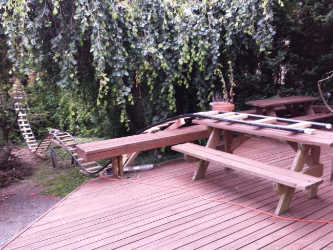 He started the coaster on his deck to save on lumber and used wood planks for the rest of the support.