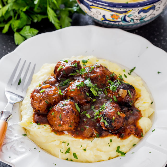 Revamp Salisbury steak as you know it, by serving these yummy <a href="http://www.jocooks.com/main-courses/beef-main-courses/salisbury-steak-meatballs-with-gravy-and-mashed-potatoes/" target="_blank">meatballs</a> over a bed of mashed potatoes. 