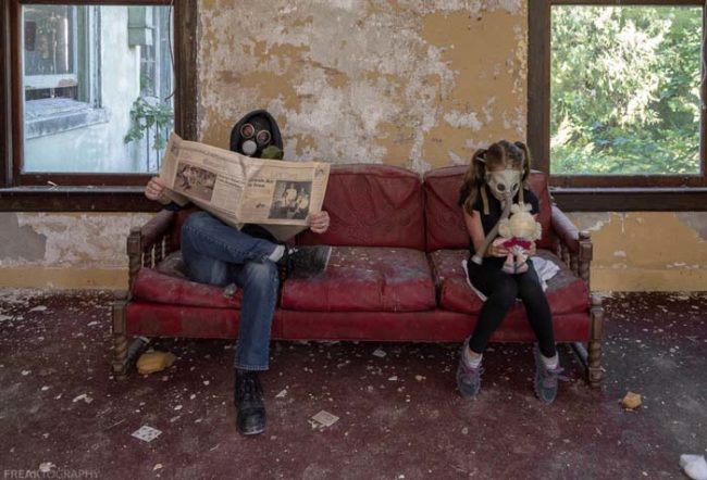 "Still too unsafe to venture outside, our post-apocalyptic father and daughter are stuck inside. The only entertainment they have is each other and whatever items were left over. Dad discovered a heap of old newspapers. The edition he reads today ironically reads 'Fresh Air Is Free,' while the young girl becomes closer with her stuffed toy doll."