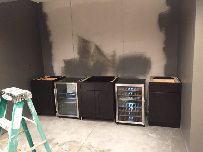 Andernic bought two refrigerators and already-finished cabinets that were easy to assemble.