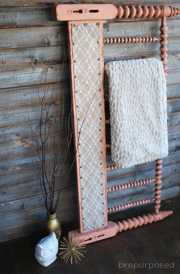 Who knew a headboard could make an awesome <a href="http://brepurposed.porch.com/2014/10/15/headboard-turned-quilt-rack/" target="_blank">quilt holder</a>?