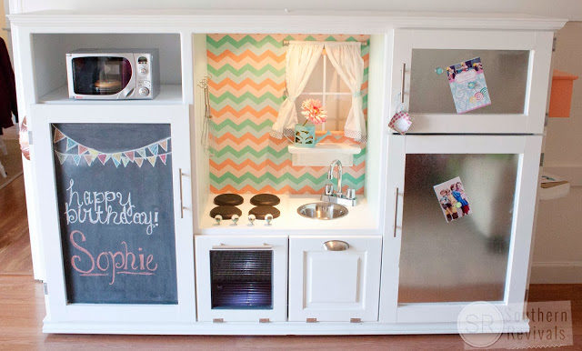 Give your kids the little kitchen they've always wanted by reusing an old <a href="http://www.southernrevivals.com/2014/02/vintage-entertainment-center-turned.html" target="_blank">entertainment center</a>.