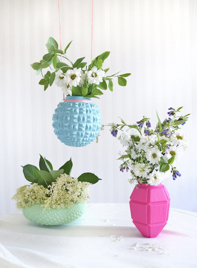 Upcycle old lampshades into unique <a href="http://thehousethatlarsbuilt.com/2015/07/upcycled-lampshade-vases.html/" target="_blank">floral vases</a>.