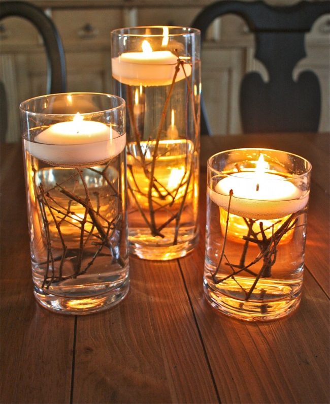 Beauty doesn't have to be fussy. Simply add sticks, water, and floating candles to your favorite votives for warm, inviting decor.