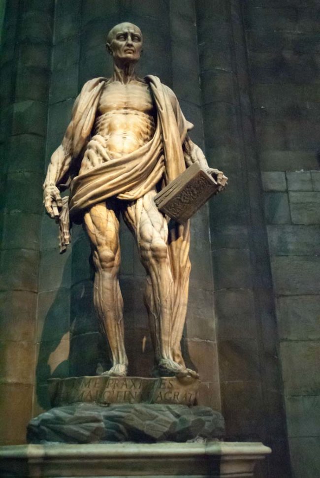 Here we have a statue of Bartholomew the Apostle. He was apparently flayed alive by the Romans. That cape he's wearing? It's not a cape at all. It's his skin.