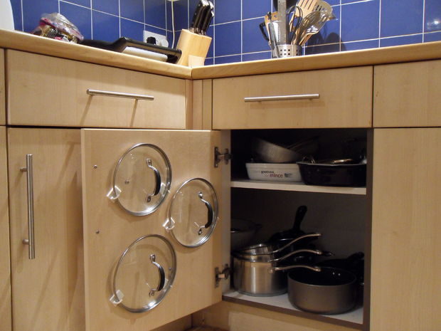 Use them to increase storage in your cupboards by mounting lids on cabinet doors.