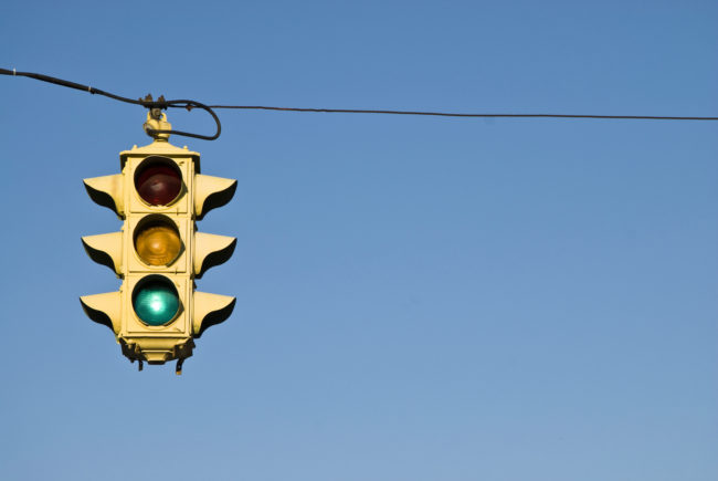 The length of a yellow light is 10 percent of the speed limit. To figure out how much time you have, keep that in mind. If the speed limit is 40 miles per hour, you have four seconds until it turns red.