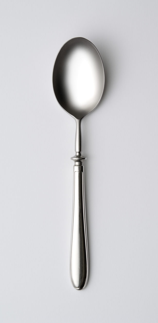 Run a metal spoon under warm water. Once it's heated up, place it over a bug bite to stop it from itching.