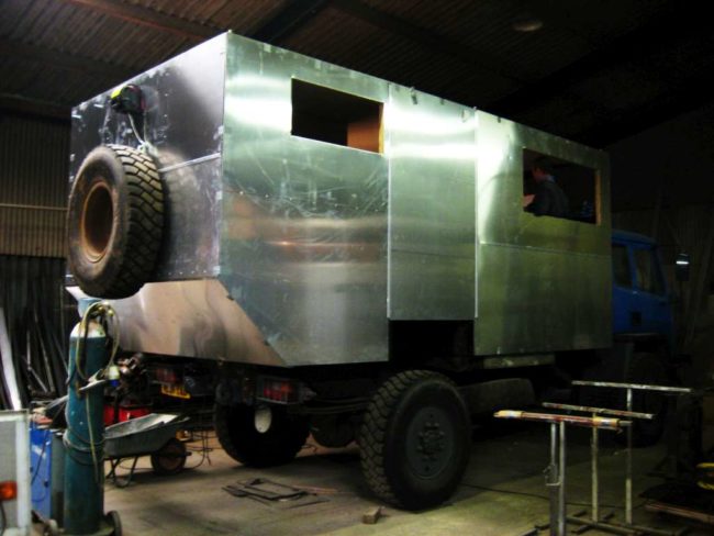Wanting a true living space that would be able to stand up to all kinds of weather conditions, they had a horse trailer company build this aluminum shell.