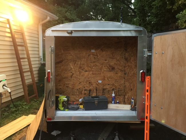 With the wall completed, he began working on shelving and other camping essentials.
