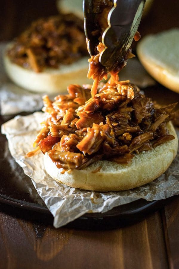 All of you <a target="_blank" href="http://homemadehooplah.com/recipes/crock-pot-sweet-pulled-pork/">pulled pork</a> lovers are going to fall in love with this sweet sandwich recipe.