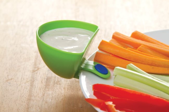 Make extra room on your plate for chips and veggies with <a href="https://www.amazon.com/gp/product/B004S67ULE/?_encoding=UTF8&amp;tag=vira0d-20" target="_blank">dip clips</a>.
