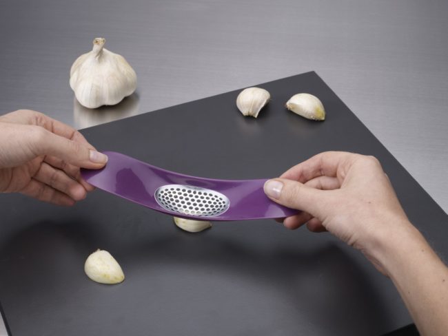 Crushing garlic has never been easier than it is with this <a href="https://www.amazon.com/gp/product/B006BSBN9W/?_encoding=UTF8&amp;tag=vira0d-20" target="_blank">garlic rocker</a>.