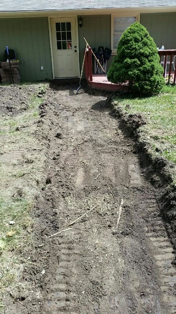 Next, he dug a ditch where the stones would go.