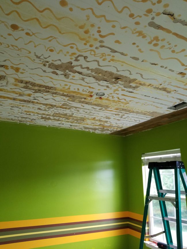 Frustrated, they left the ceiling like this for a couple of years before their son moved into a different room.