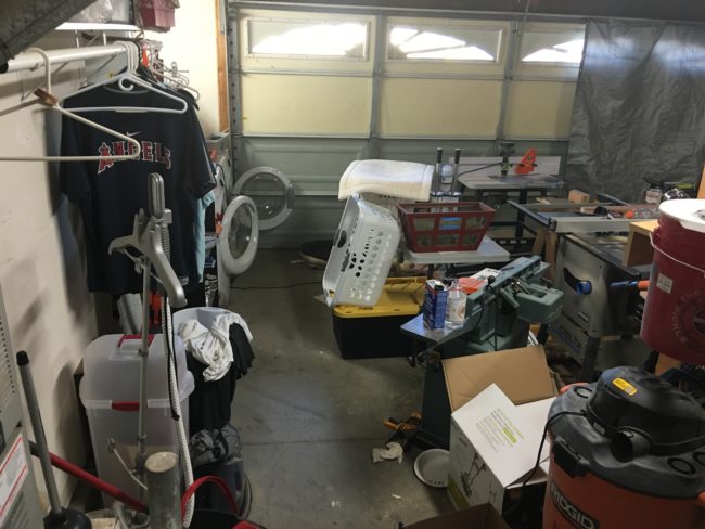 Before he could begin renovating the garage floor, he needed to clear out all the junk.