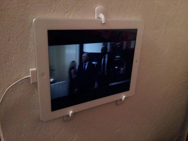 There's nothing worse than having to constantly hold your iPad while watching TV in bed. Why not try this inexpensive wall mount that will give you a little freedom?