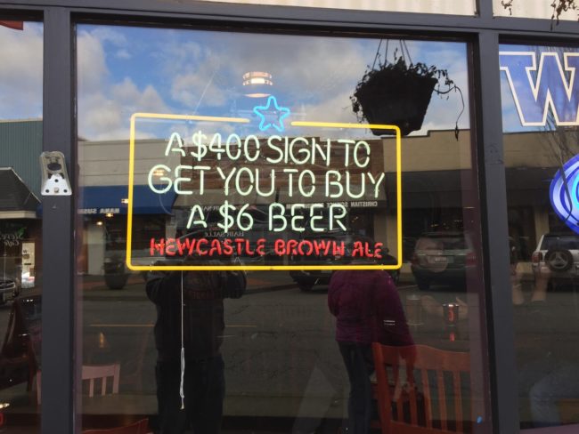 There's nothing actually wrong with the lighting on this sign, however something tells me this isn't what they ordered.