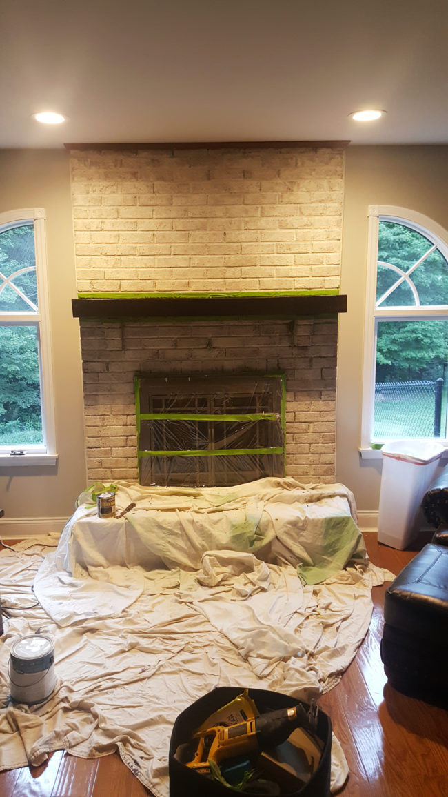 Then she sanded the mantle and gave it a dark stain, finishing with a couple coats of polyurethane.