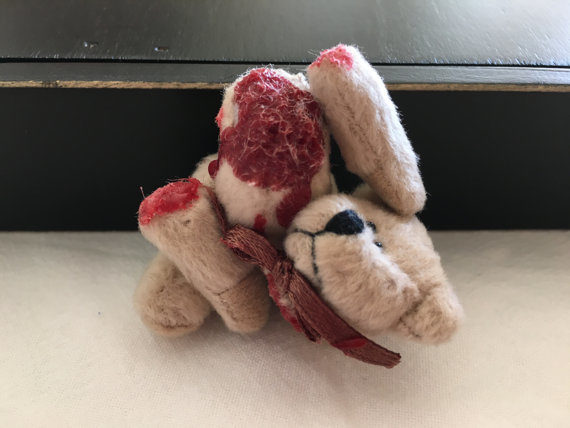 Give your kids nightmares forever with this horribly <a href="https://www.etsy.com/listing/266890057/let-me-rub-your-little-head-mr-teddy?ref=related-3" target="_blank">mangled teddy bear</a>.