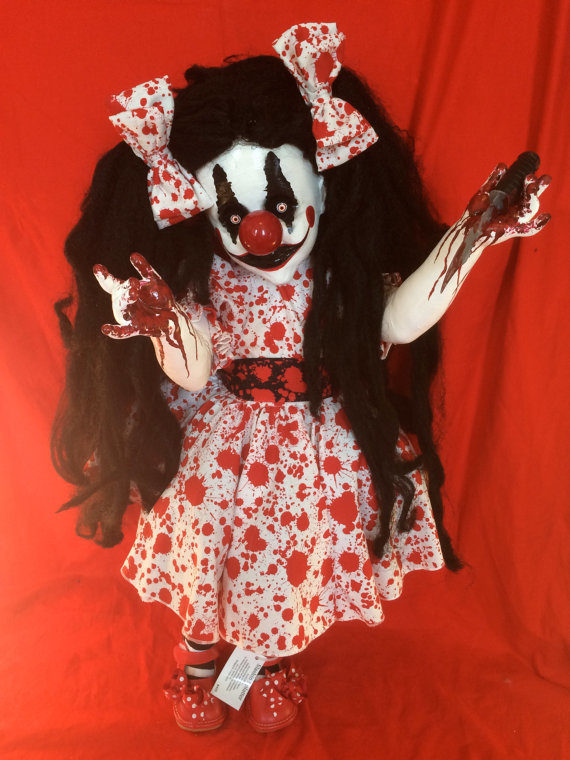 How would you ever sleep with this horrifying <a target="_blank" href="https://www.etsy.com/listing/221086511/slashin-splatter?ref=unav_listing-other">clown doll</a> in your house?