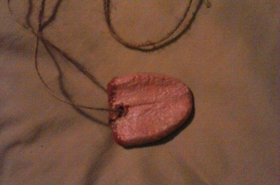 I bet this <a href="https://www.etsy.com/listing/246946160/freshly-severed-tongue-necklace?ref=related-4" target="_blank">severed tongue necklace</a> goes with everything!