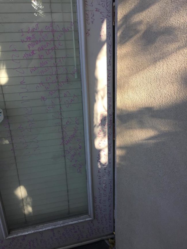The scrawled purple handwriting appeared to be that of a homeless woman and covered nearly the entire door and window. The writing said things like, "I don't want to get arrest [sic] but their [sic] aren't willing to leave me alone."