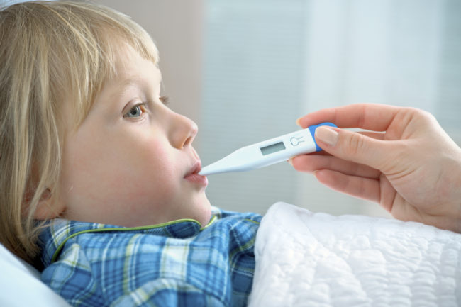 <a href="http://www.kidshealth.org.nz/flu-influenza" target="_blank">Symptoms</a> to watch out for include high-grade fever, body aches and chills, sore throat, lethargy, headache, and a runny or stuffy nose. The flu can also lead to <a href="http://www.webmd.com/cold-and-flu/flu-guide/children-and-flu-influenza#2" target="_blank">issues</a> like sinus congestion, ear infection, and even pneumonia.