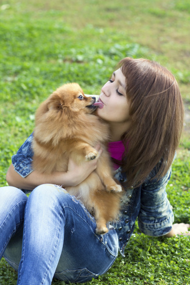 The old adage about dogs' mouths being cleaner may be true, but not enough where you'd want to share their germs.  Allowing your pup to lick your mouth can actually transmit nasty diseases that we aren't meant to tolerate.