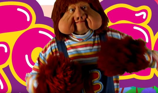 Fof&atilde;o is from a Brazilian children's show in which he is a magical alien that came down to Earth to start a band and sing with a bunch of young kids.  His horrifying face really says it all.