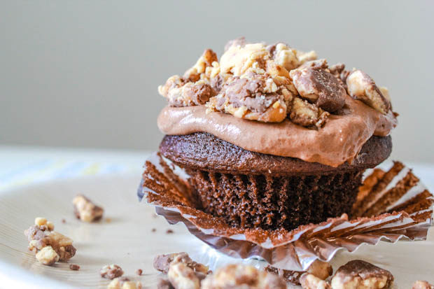 These <a href="http://sallysbakingaddiction.com/2012/06/26/snickers-chocolate-mousse-cupcakes/" target="_blank">Snickers cupcakes</a> are so pleasing to the eye, that you'd never know they weren't baked from scratch.