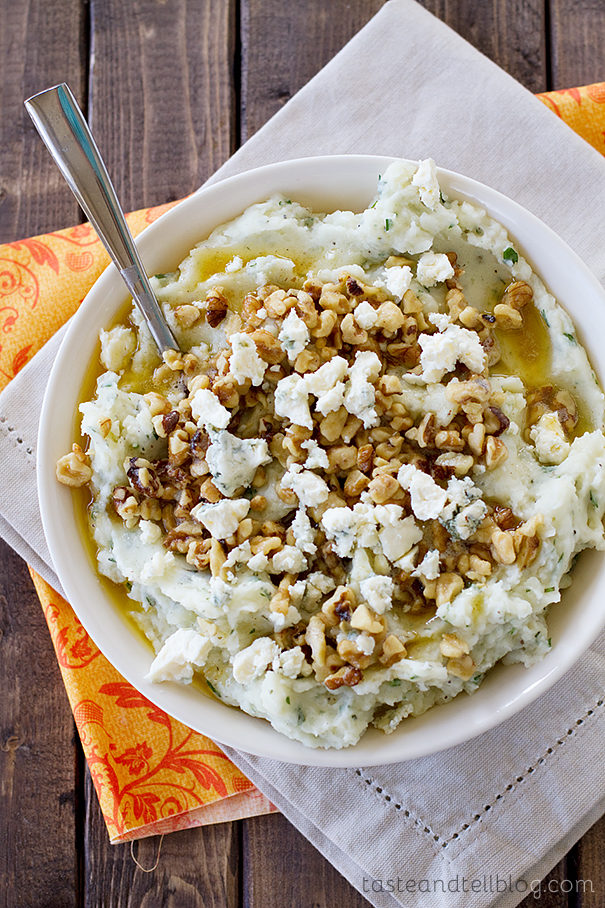 Adding <a href="http://www.tasteandtellblog.com/blue-cheese-and-walnut-mashed-potatoes/" target="_blank">blue cheese and walnuts</a> to mashed potatoes makes them feel less like a boring old side and more like an edible adventure.